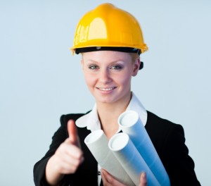 3678966-female-constrcution-worker-with-blueprints